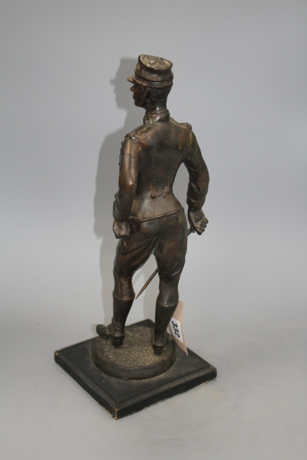 A bronze figure of a late 19th century Military officer, on ebonised plinth, height 38cm